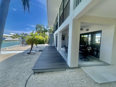 Full Duplex: Live in the gorgeous, NEW, lower level, which is on Key Colony Beach Golf Course in Florida - for sale on GolfHomes.com, golf home, golf lot