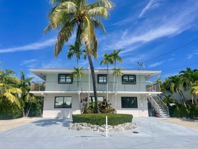 Full Duplex: Live in the gorgeous, NEW, lower level, which is on Key Colony Beach Golf Course in Florida - for sale on GolfHomes.com, golf home, golf lot