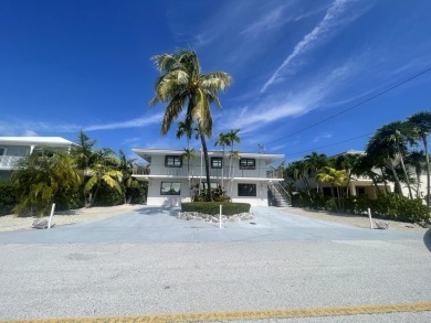 Full Duplex: Live in the gorgeous, NEW, lower level, which is on Key Colony Beach Golf Course in Florida - for sale on GolfHomes.com, golf home, golf lot