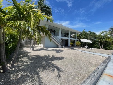 Full Duplex: Live in the gorgeous, NEW, lower level, which is on Key Colony Beach Golf Course in Florida - for sale on GolfHomes.com, golf home, golf lot