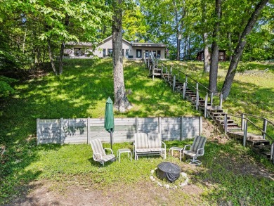 This beautiful Lake Mecosta property features 137 feet of nice on St. Ives Golf Club in Michigan - for sale on GolfHomes.com, golf home, golf lot
