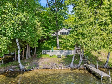 This beautiful Lake Mecosta property features 137 feet of nice on St. Ives Golf Club in Michigan - for sale on GolfHomes.com, golf home, golf lot
