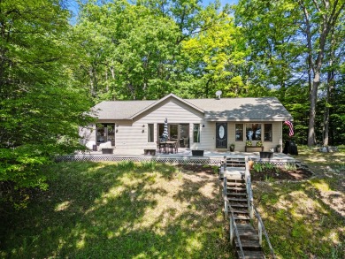This beautiful Lake Mecosta property features 137 feet of nice on St. Ives Golf Club in Michigan - for sale on GolfHomes.com, golf home, golf lot