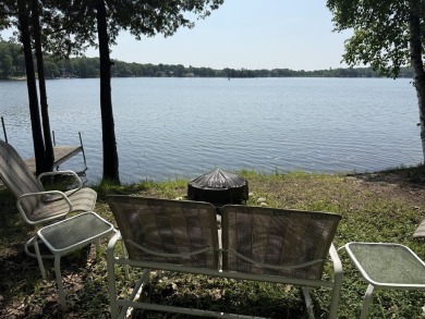 This beautiful Lake Mecosta property features 137 feet of nice on St. Ives Golf Club in Michigan - for sale on GolfHomes.com, golf home, golf lot
