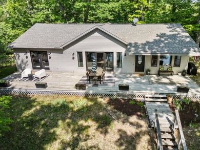 This beautiful Lake Mecosta property features 137 feet of nice on St. Ives Golf Club in Michigan - for sale on GolfHomes.com, golf home, golf lot