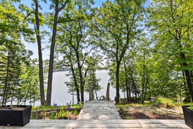 This beautiful Lake Mecosta property features 137 feet of nice on St. Ives Golf Club in Michigan - for sale on GolfHomes.com, golf home, golf lot