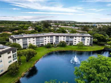 Rarely available CORNER UNIT on the water. Stunning and freshly on Wynmoor Golf Course in Florida - for sale on GolfHomes.com, golf home, golf lot