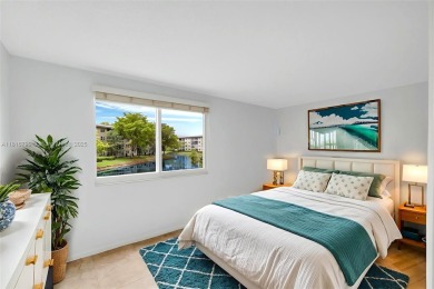 Rarely available CORNER UNIT on the water. Stunning and freshly on Wynmoor Golf Course in Florida - for sale on GolfHomes.com, golf home, golf lot