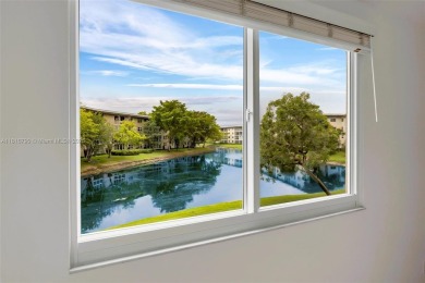 Rarely available CORNER UNIT on the water. Stunning and freshly on Wynmoor Golf Course in Florida - for sale on GolfHomes.com, golf home, golf lot