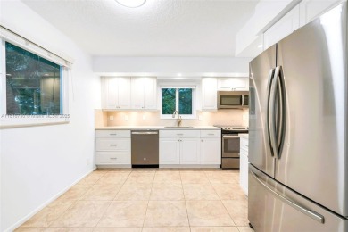 Rarely available CORNER UNIT on the water. Stunning and freshly on Wynmoor Golf Course in Florida - for sale on GolfHomes.com, golf home, golf lot