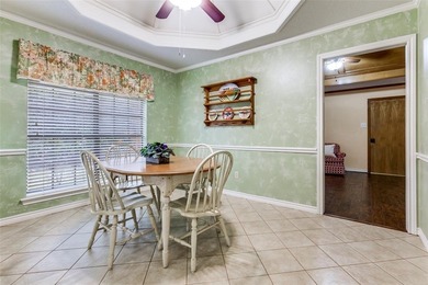 Absolutely impeccable and brimming with curb appeal, this on Duck Creek Golf Club in Texas - for sale on GolfHomes.com, golf home, golf lot