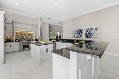 Golfers, entertainers, and chefs- this is the home that checks on The Golden Bear Club At Keenes Pointe in Florida - for sale on GolfHomes.com, golf home, golf lot