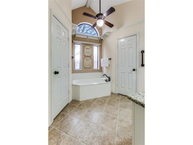 Absolutely impeccable and brimming with curb appeal, this on Duck Creek Golf Club in Texas - for sale on GolfHomes.com, golf home, golf lot