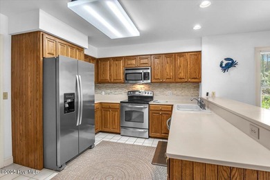 Discover Coastal Charm in Caswell Beach's Arboretum! Welcome to on Oak Island Golf Club in North Carolina - for sale on GolfHomes.com, golf home, golf lot