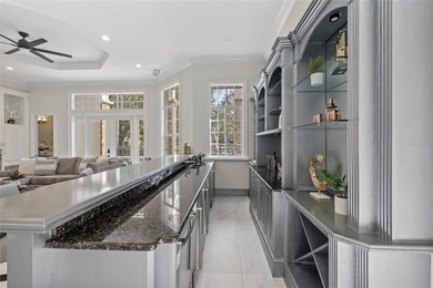 Golfers, entertainers, and chefs- this is the home that checks on The Golden Bear Club At Keenes Pointe in Florida - for sale on GolfHomes.com, golf home, golf lot