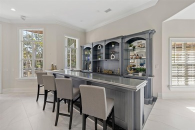 Golfers, entertainers, and chefs- this is the home that checks on The Golden Bear Club At Keenes Pointe in Florida - for sale on GolfHomes.com, golf home, golf lot