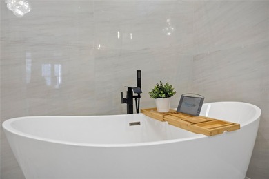 Golfers, entertainers, and chefs- this is the home that checks on The Golden Bear Club At Keenes Pointe in Florida - for sale on GolfHomes.com, golf home, golf lot