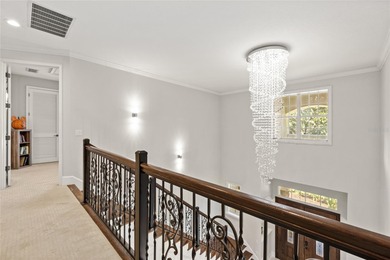 Golfers, entertainers, and chefs- this is the home that checks on The Golden Bear Club At Keenes Pointe in Florida - for sale on GolfHomes.com, golf home, golf lot