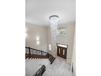 Golfers, entertainers, and chefs- this is the home that checks on The Golden Bear Club At Keenes Pointe in Florida - for sale on GolfHomes.com, golf home, golf lot