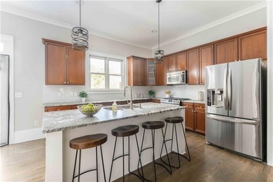 Live the East Lake lifestyle in Olmsted, where modern comfort on East Lake Golf Club in Georgia - for sale on GolfHomes.com, golf home, golf lot