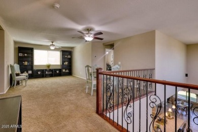 This beautiful 2,706-sqft home features an open floor plan with on Poston Butte Golf Club in Arizona - for sale on GolfHomes.com, golf home, golf lot