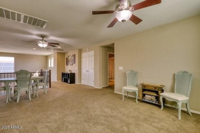 This beautiful 2,706-sqft home features an open floor plan with on Poston Butte Golf Club in Arizona - for sale on GolfHomes.com, golf home, golf lot