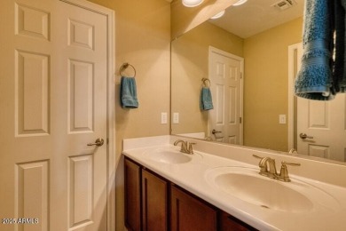This beautiful 2,706-sqft home features an open floor plan with on Poston Butte Golf Club in Arizona - for sale on GolfHomes.com, golf home, golf lot