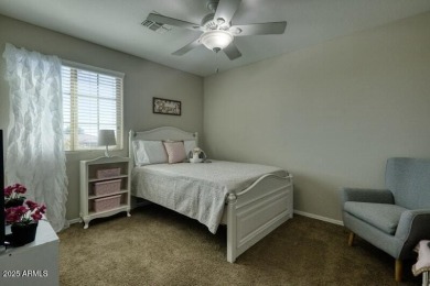This beautiful 2,706-sqft home features an open floor plan with on Poston Butte Golf Club in Arizona - for sale on GolfHomes.com, golf home, golf lot