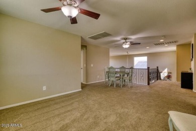 This beautiful 2,706-sqft home features an open floor plan with on Poston Butte Golf Club in Arizona - for sale on GolfHomes.com, golf home, golf lot