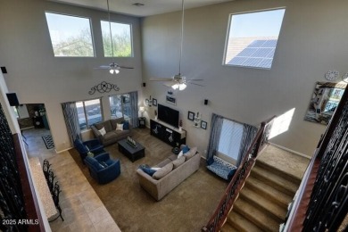 This beautiful 2,706-sqft home features an open floor plan with on Poston Butte Golf Club in Arizona - for sale on GolfHomes.com, golf home, golf lot