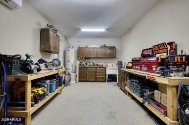 This beautiful 2,706-sqft home features an open floor plan with on Poston Butte Golf Club in Arizona - for sale on GolfHomes.com, golf home, golf lot