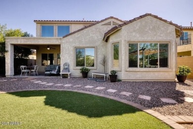 This beautiful 2,706-sqft home features an open floor plan with on Poston Butte Golf Club in Arizona - for sale on GolfHomes.com, golf home, golf lot