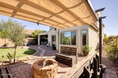 This beautiful 2,706-sqft home features an open floor plan with on Poston Butte Golf Club in Arizona - for sale on GolfHomes.com, golf home, golf lot