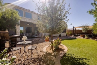 This beautiful 2,706-sqft home features an open floor plan with on Poston Butte Golf Club in Arizona - for sale on GolfHomes.com, golf home, golf lot