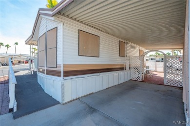 Corner Lot Retreat with Deck and Spacious Bonus Room in on Riverview Golf Course in Arizona - for sale on GolfHomes.com, golf home, golf lot