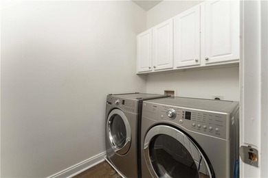 Live the East Lake lifestyle in Olmsted, where modern comfort on East Lake Golf Club in Georgia - for sale on GolfHomes.com, golf home, golf lot