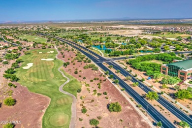 This beautiful 2,706-sqft home features an open floor plan with on Poston Butte Golf Club in Arizona - for sale on GolfHomes.com, golf home, golf lot