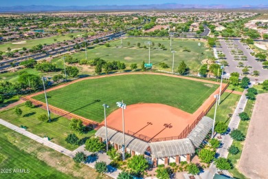 This beautiful 2,706-sqft home features an open floor plan with on Poston Butte Golf Club in Arizona - for sale on GolfHomes.com, golf home, golf lot
