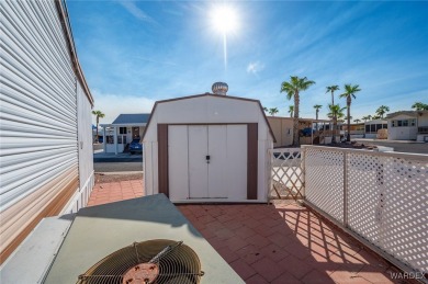 Corner Lot Retreat with Deck and Spacious Bonus Room in on Riverview Golf Course in Arizona - for sale on GolfHomes.com, golf home, golf lot