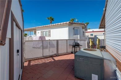 Corner Lot Retreat with Deck and Spacious Bonus Room in on Riverview Golf Course in Arizona - for sale on GolfHomes.com, golf home, golf lot