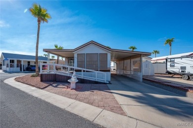 Corner Lot Retreat with Deck and Spacious Bonus Room in on Riverview Golf Course in Arizona - for sale on GolfHomes.com, golf home, golf lot