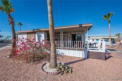 Corner Lot Retreat with Deck and Spacious Bonus Room in on Riverview Golf Course in Arizona - for sale on GolfHomes.com, golf home, golf lot