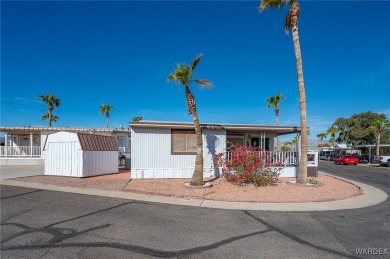 Corner Lot Retreat with Deck and Spacious Bonus Room in on Riverview Golf Course in Arizona - for sale on GolfHomes.com, golf home, golf lot