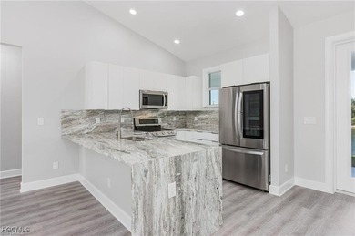 Beautiful waterfront single-family home - take advantage of an on Burnt Store Golf Club in Florida - for sale on GolfHomes.com, golf home, golf lot