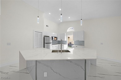 Completely Remodeled Luxury Home in Premier 55+ Golf Community on Sabal Springs Golf and Racquet Club in Florida - for sale on GolfHomes.com, golf home, golf lot