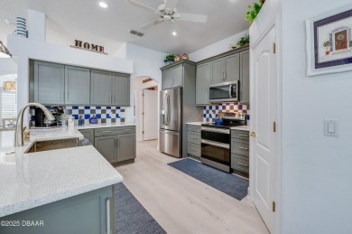 WOW! Look at that AMAZING outdoor living space with a stunning on LPGA International Golf Course in Florida - for sale on GolfHomes.com, golf home, golf lot