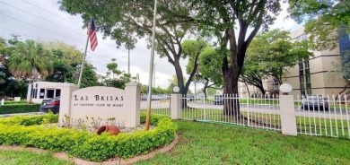 This  a   2 bedroom  2 bath condo  unit located on the  first on Country Club of Miami in Florida - for sale on GolfHomes.com, golf home, golf lot