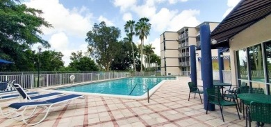 This  a   2 bedroom  2 bath condo  unit located on the  first on Country Club of Miami in Florida - for sale on GolfHomes.com, golf home, golf lot