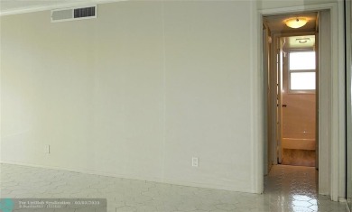 HUGE PRICE REDUCTION! This 5th-floor condo offers 1,500 square on Palm-Aire Country Club and Resort - The Oaks in Florida - for sale on GolfHomes.com, golf home, golf lot