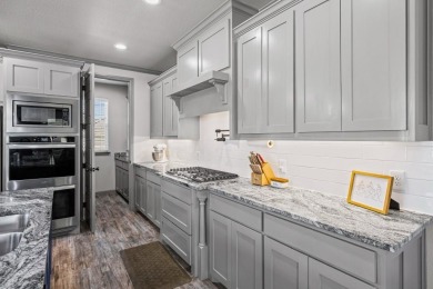 Move-in ready 4 bedroom, 2.5 bath home in the heart of on Legends Country Club in Texas - for sale on GolfHomes.com, golf home, golf lot